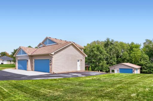 4 Stall Garage with Driveway to detached Garage/Pole Building