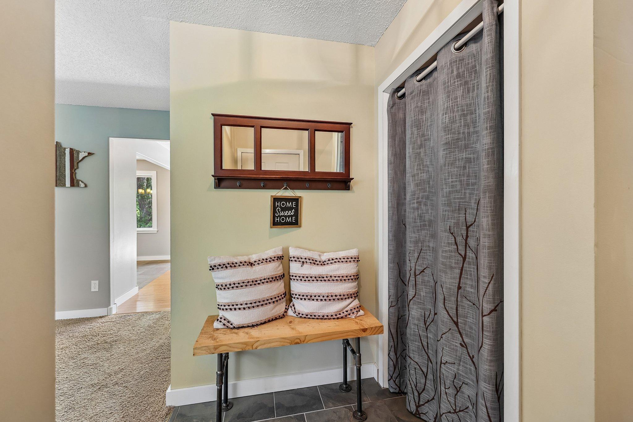 Ample storage located in the foyer of the home.