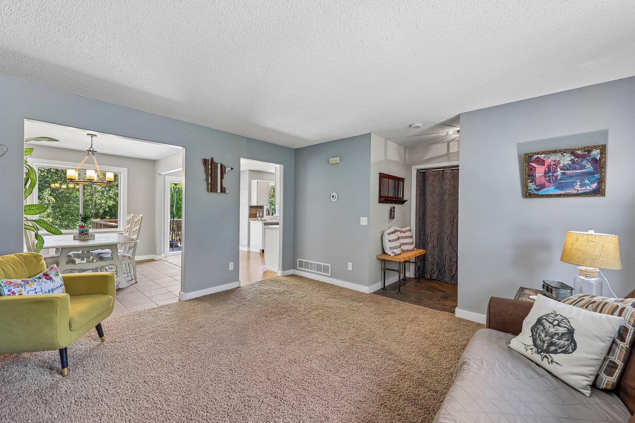 Open to the kitchen and formal dining area making this a space to entertain.