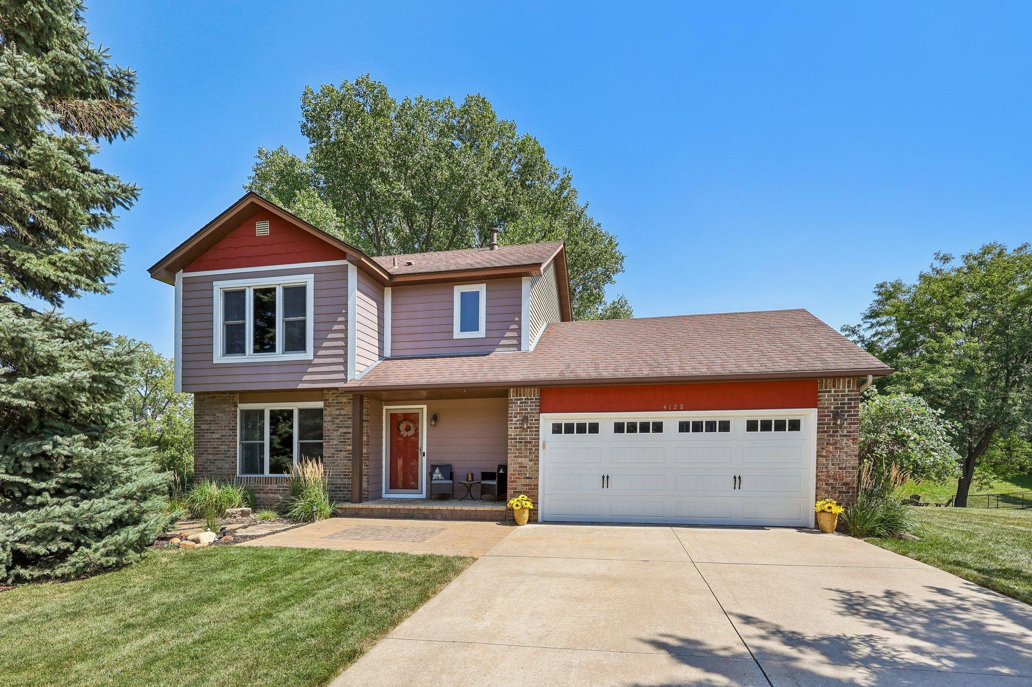 Welcome Home! Beautiful curb appeal awaits you at this well maintained home located just steps from Eagan high school.