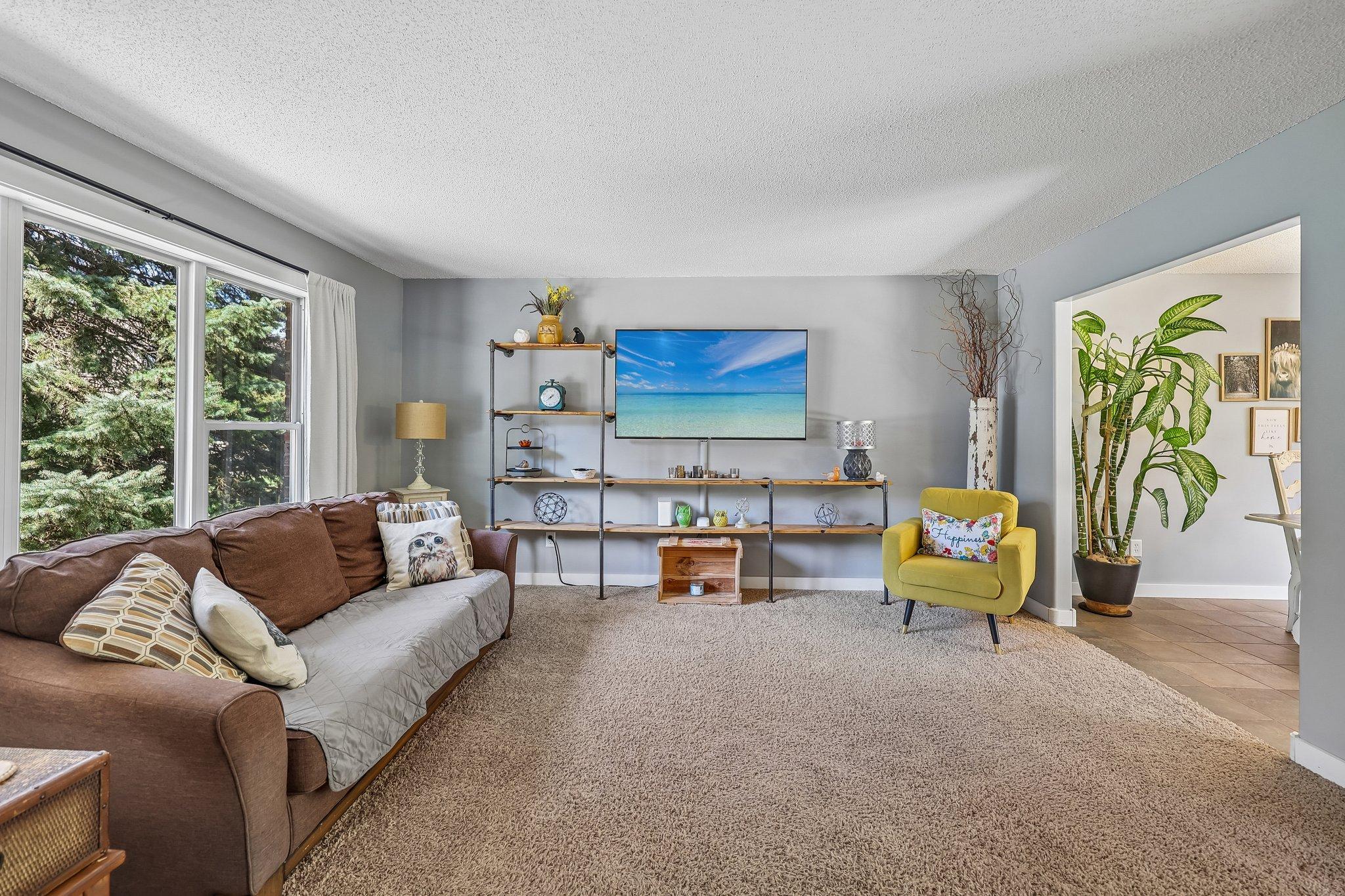 Enjoy time spent here with family and friends in this bright and airy living space.