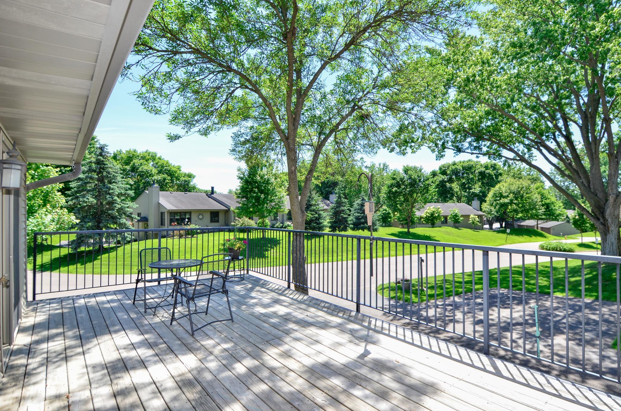 The large deck and an unusual, coveted expansive view from this desirable end unit—offers a sense of openness and privacy that is truly hard to find.