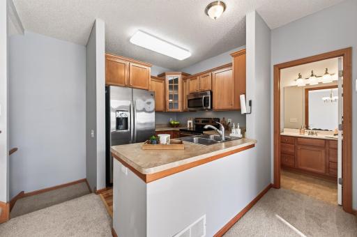 Kitchen with an area that could be used as a breakfast bar.