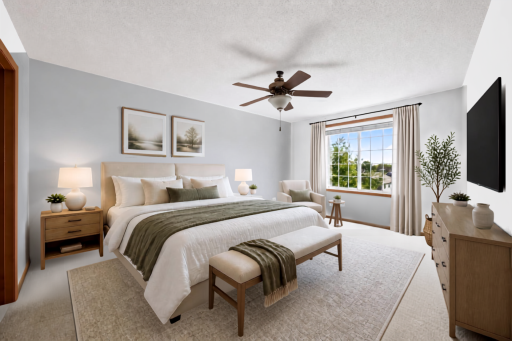 Top-level primary bedroom. (Virtually staged)