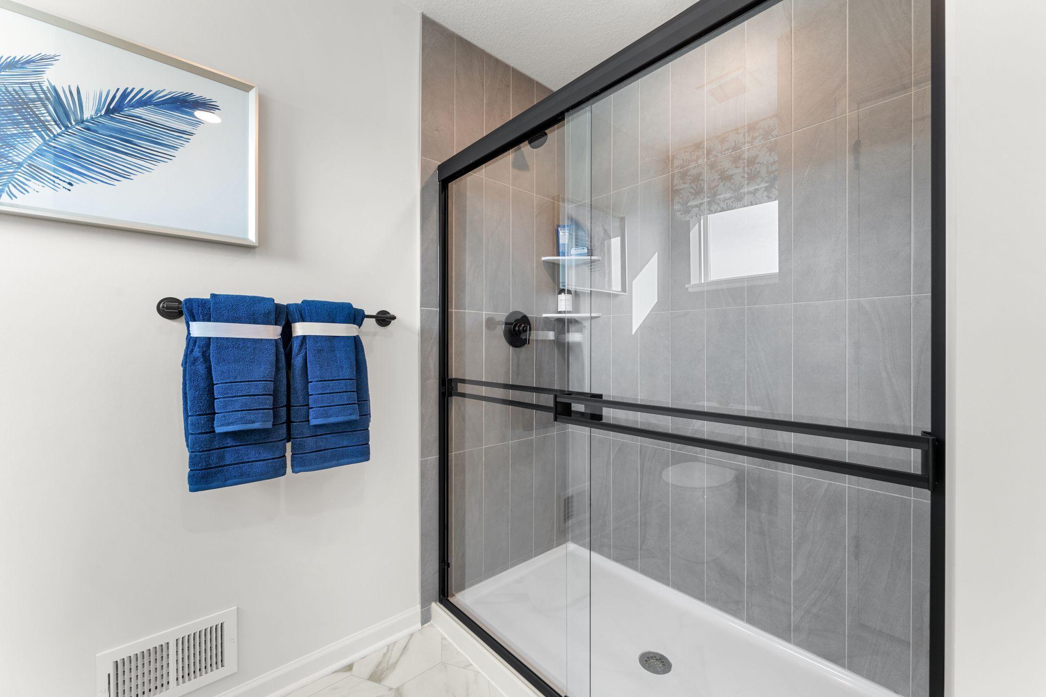 Another view of the owners bath with step in shower. (Photo of model home, color and options may vary)