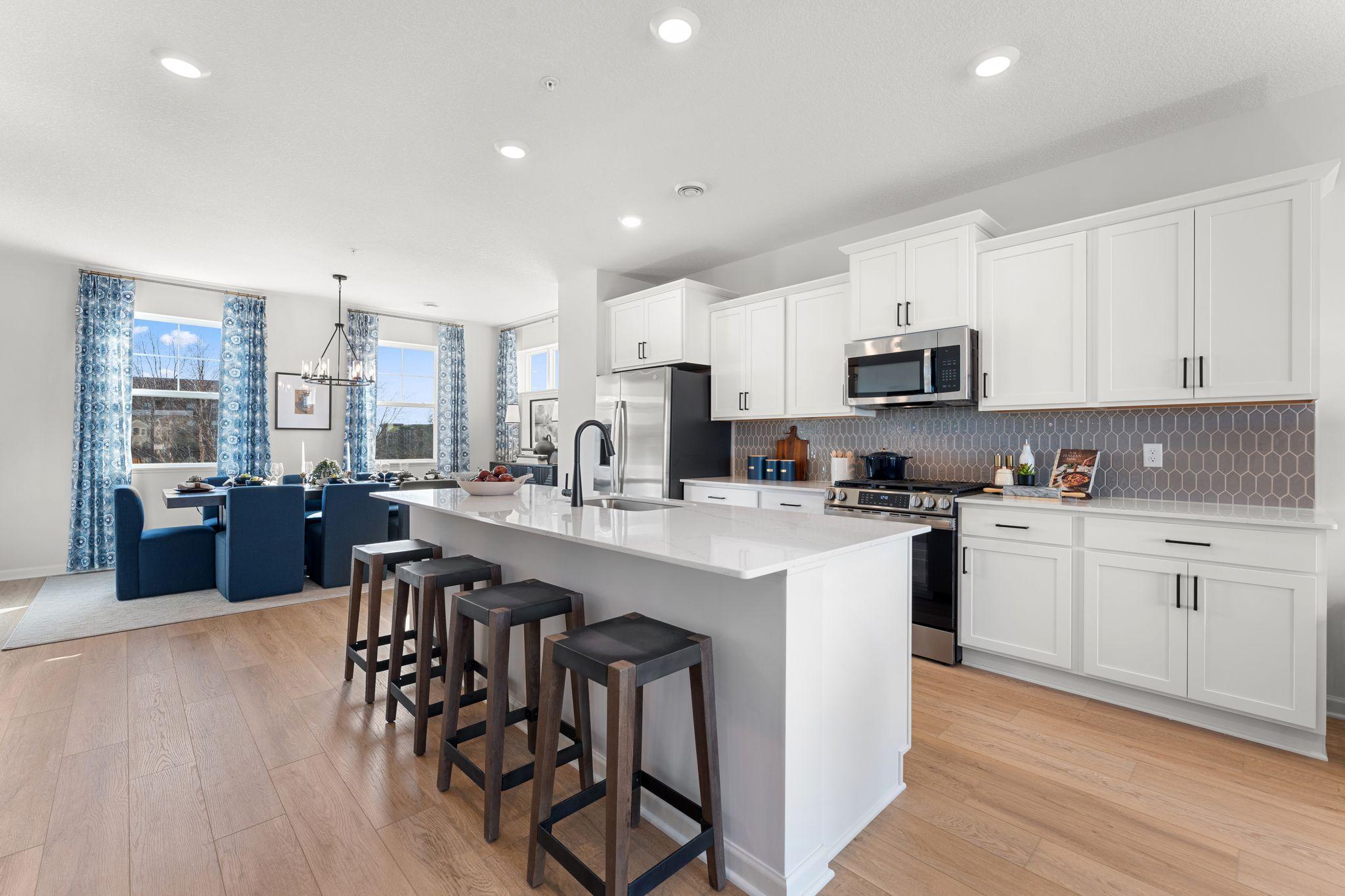 The island is a great space for casual dining. Similar home shown, Color and options can vary.