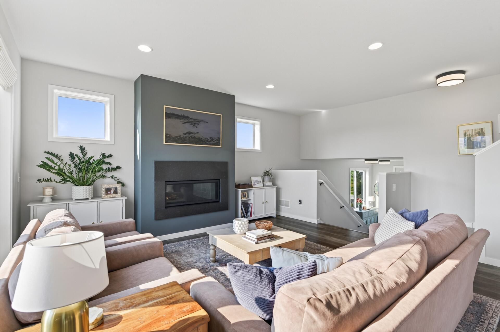 Striking floor to ceiling gas fireplace