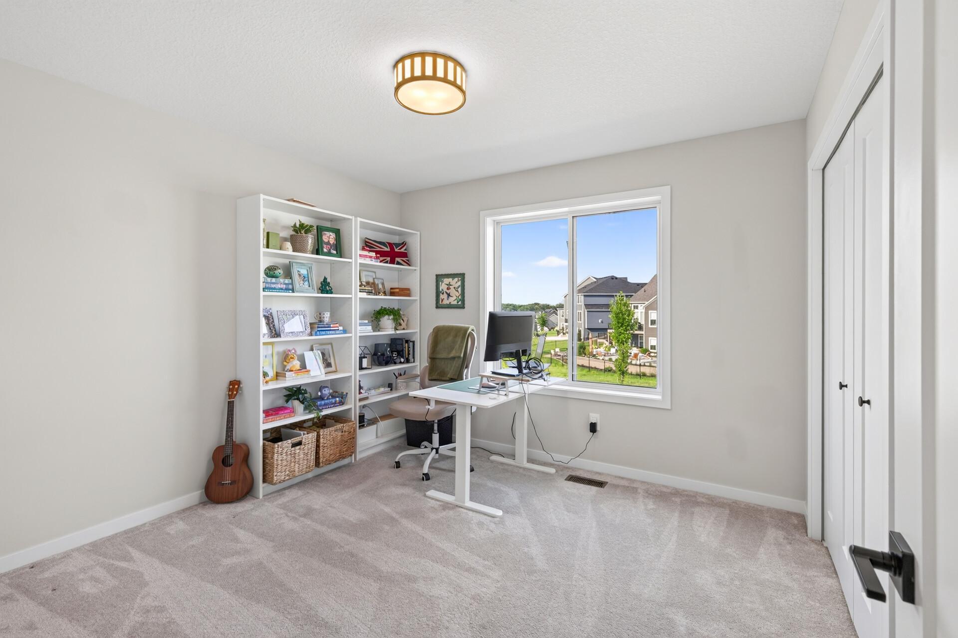 One of the upper level bedrooms is currently being used as an office
