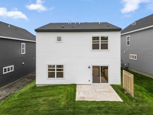 The backyard has sod, irrigation and a patio ready for your furniture.