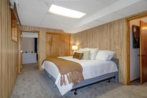Family Room in lower level currently set up as 6th bedroom