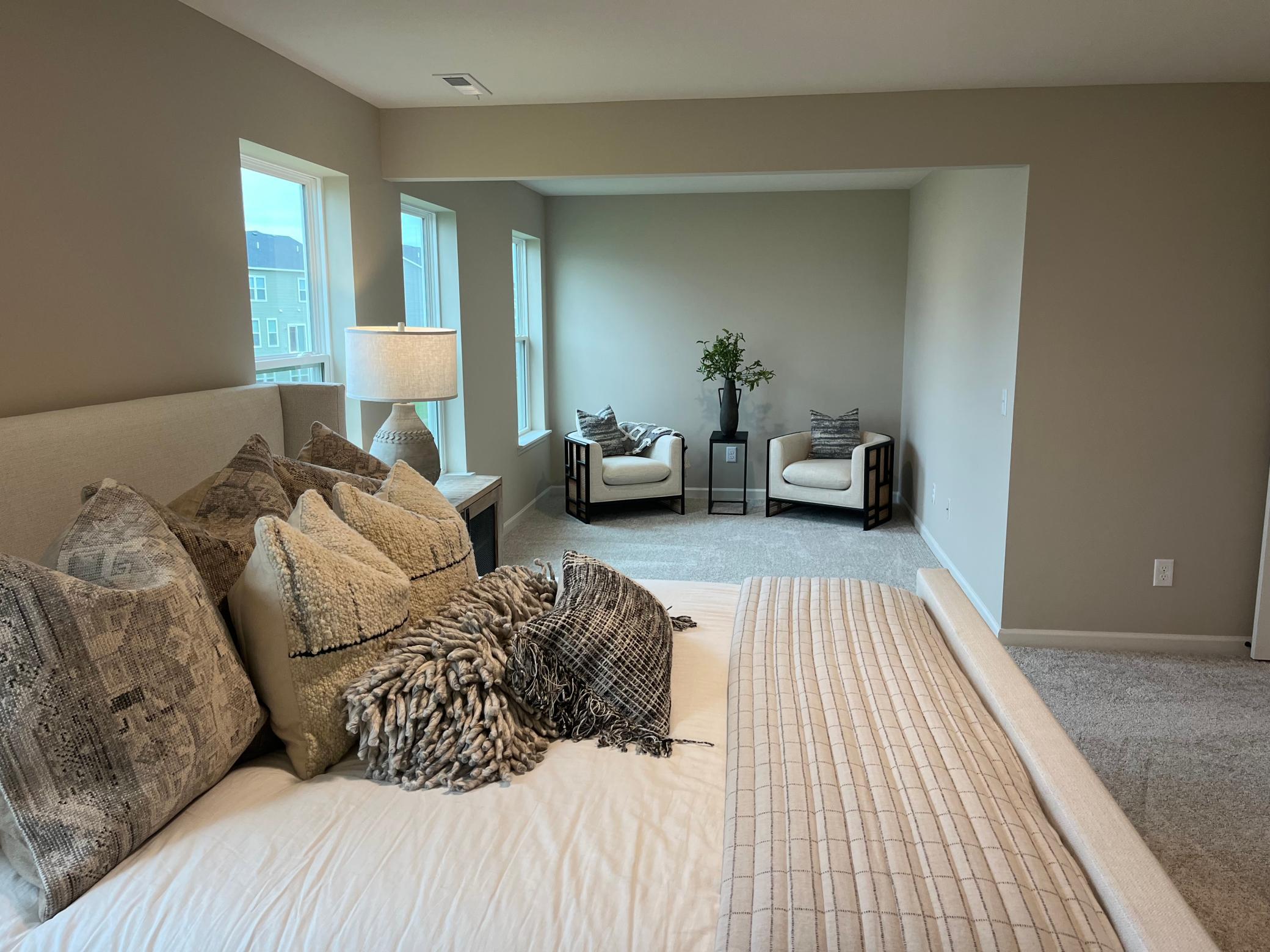 Same floorplan - staged. Owner's-suite for primary bedroom getaway