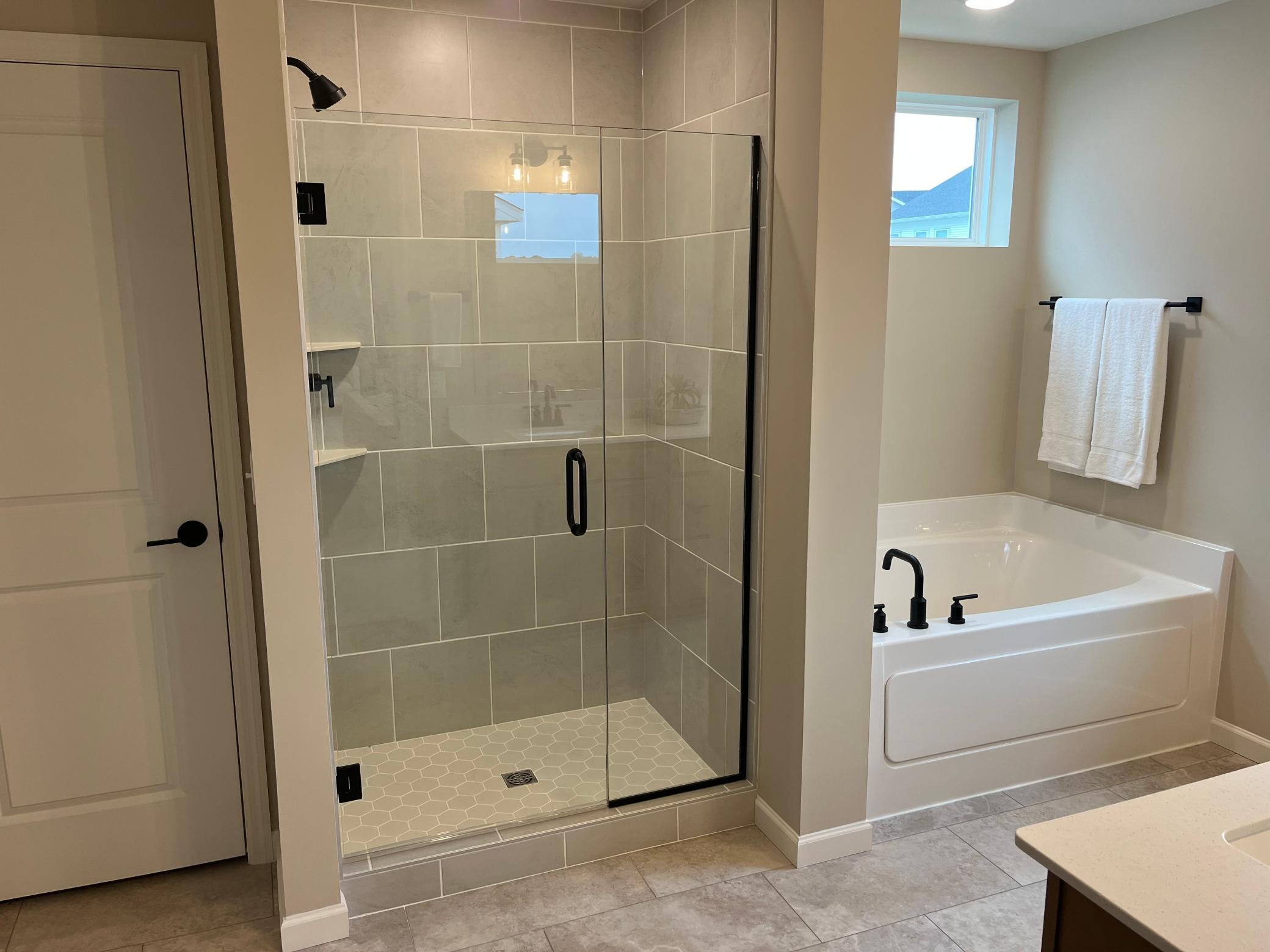 Same floorplan - staged. Primary bathroom