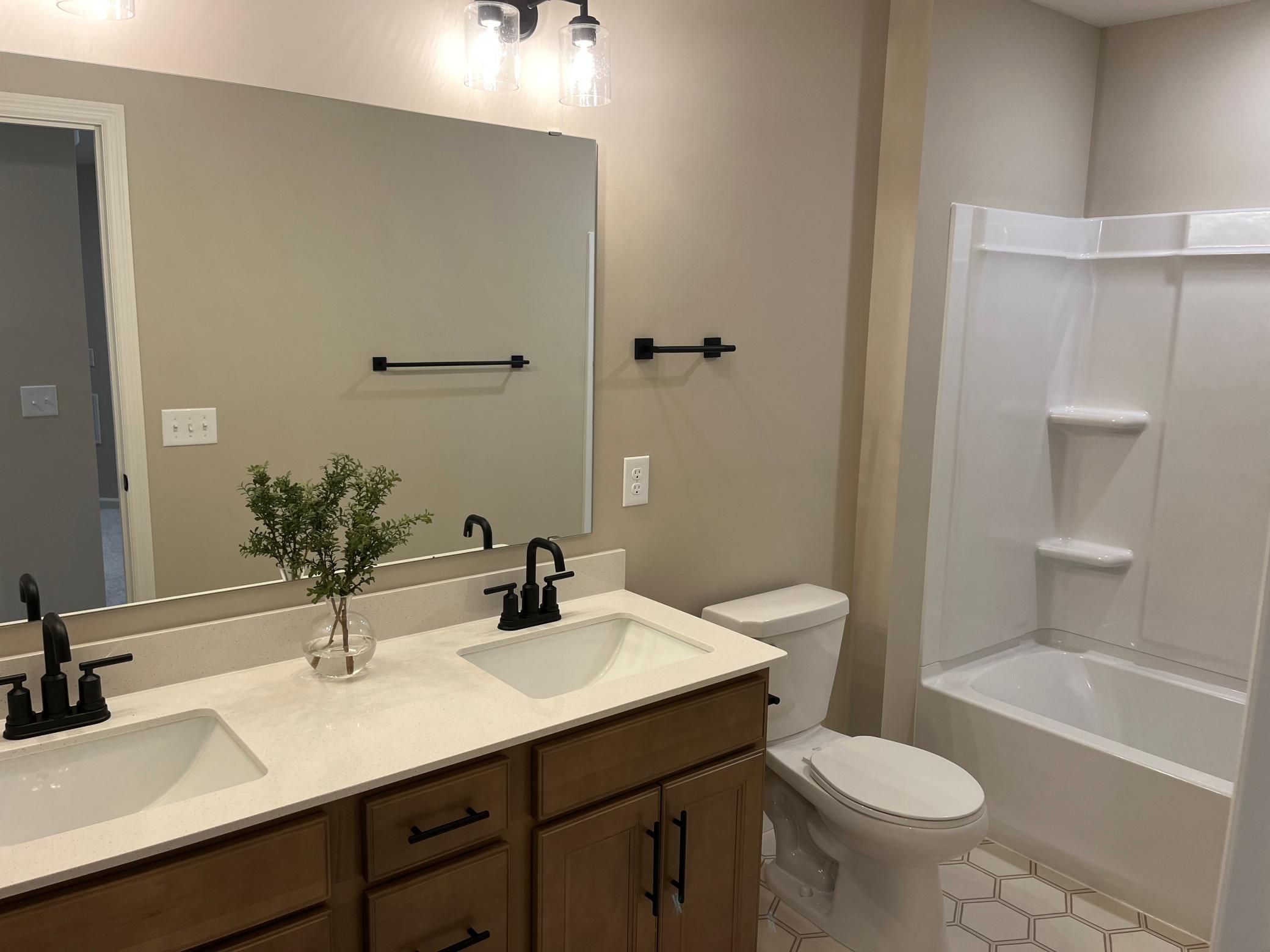 Same floorplan - staged. Secondary full-bathroom