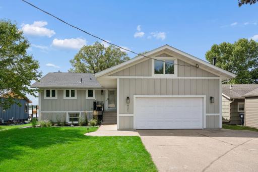 Stunning Curb Appeal Meets Timeless Lakefront Charm