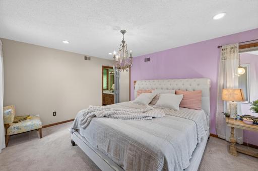 Another view of the primary bedroom.