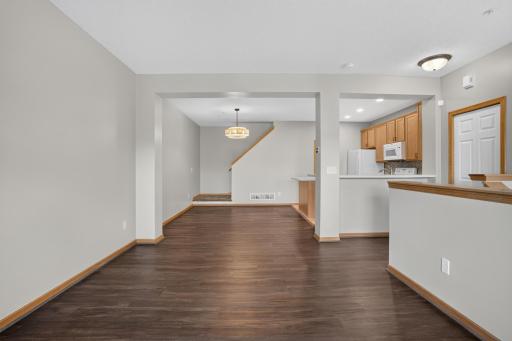 Updated LVP flooring provides a clean, cohesive look throughout the main level.