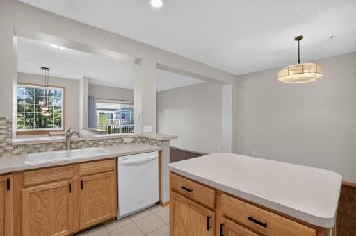 Center island provides additional prep space and room for casual seating.
