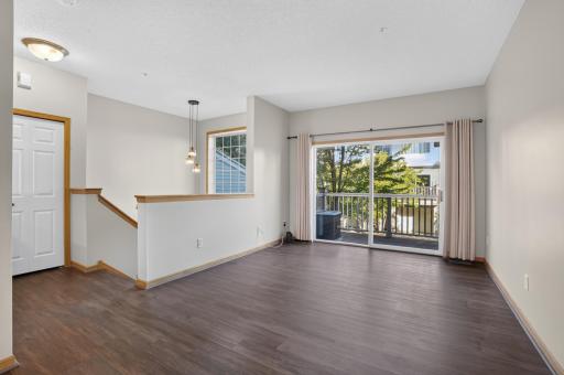 Living area offers direct access to the deck for easy indoor-outdoor living.