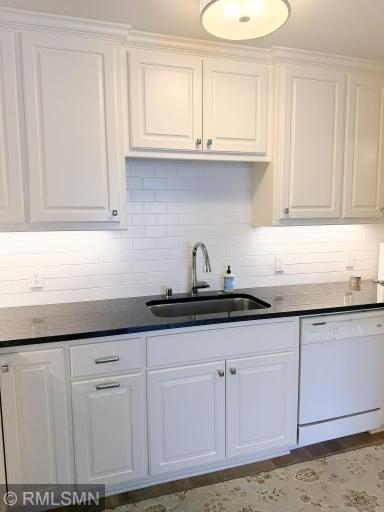Granite countertops and deep sink with garbage disposal!