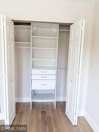 Opens up to a custom closet system!