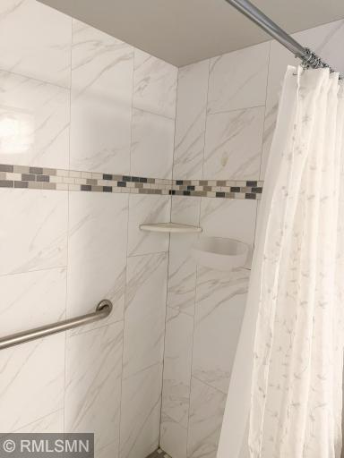 Beautiful detailed shower tile!
