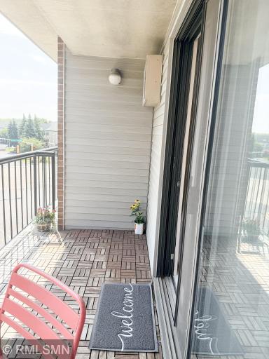 Step out onto the balcony from the sliding patio doors!