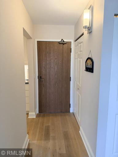 Entryway with wood door that automatically locks!