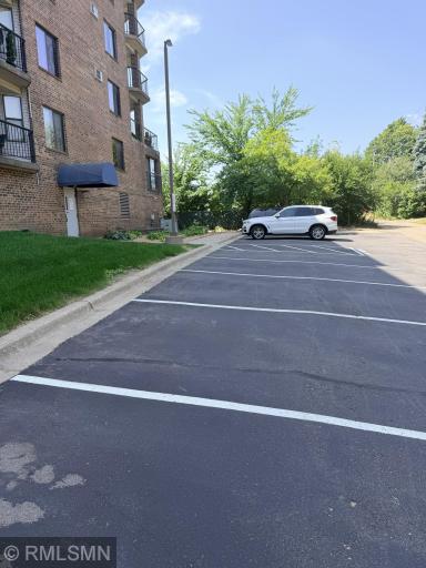 Parking lot in the back has sixteen spaces!