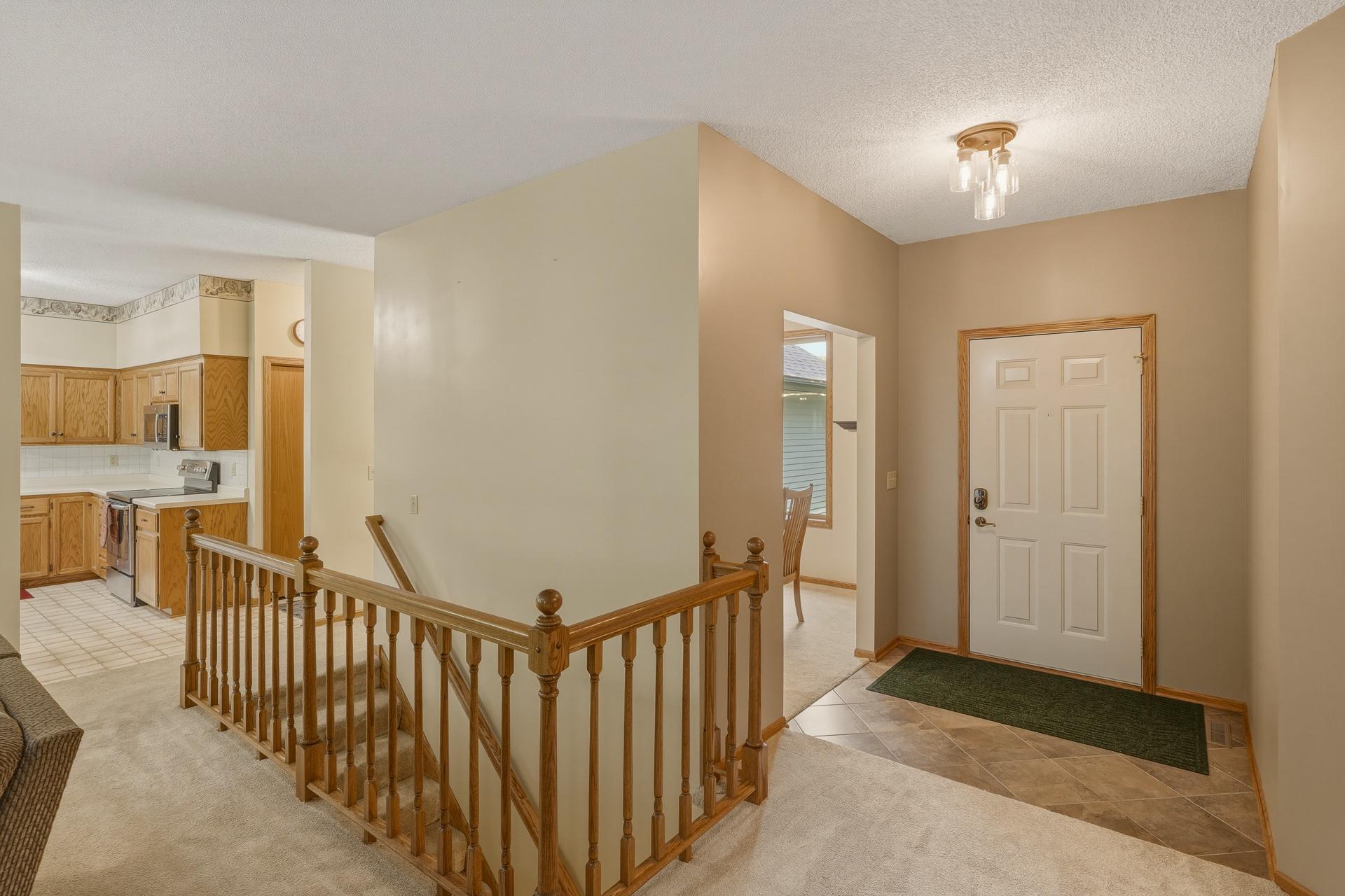 Welcome Home! Step Inside to an Inviting Entryway that Opens to the Main Living Areas, Offering an Easy Flow Throughout this Spacious One-Level Home