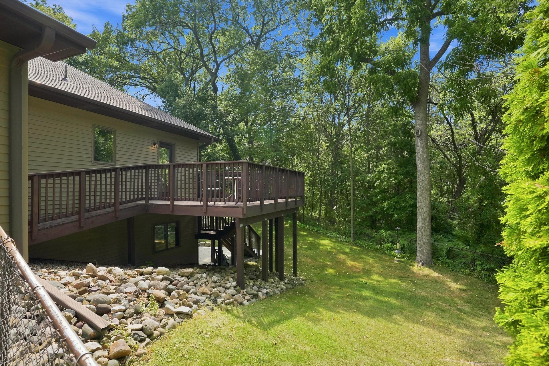 The Large Deck has a Convenient Ramp Providing Easy Access Between the Deck and the Garage