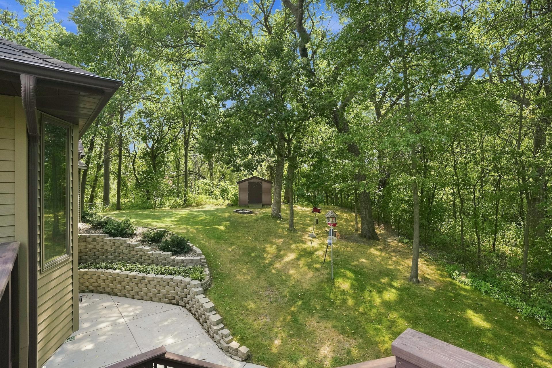 Enjoy the Privacy of the Rear Yard with the Surrounding Wooded Area and Beautiful Landscaping!