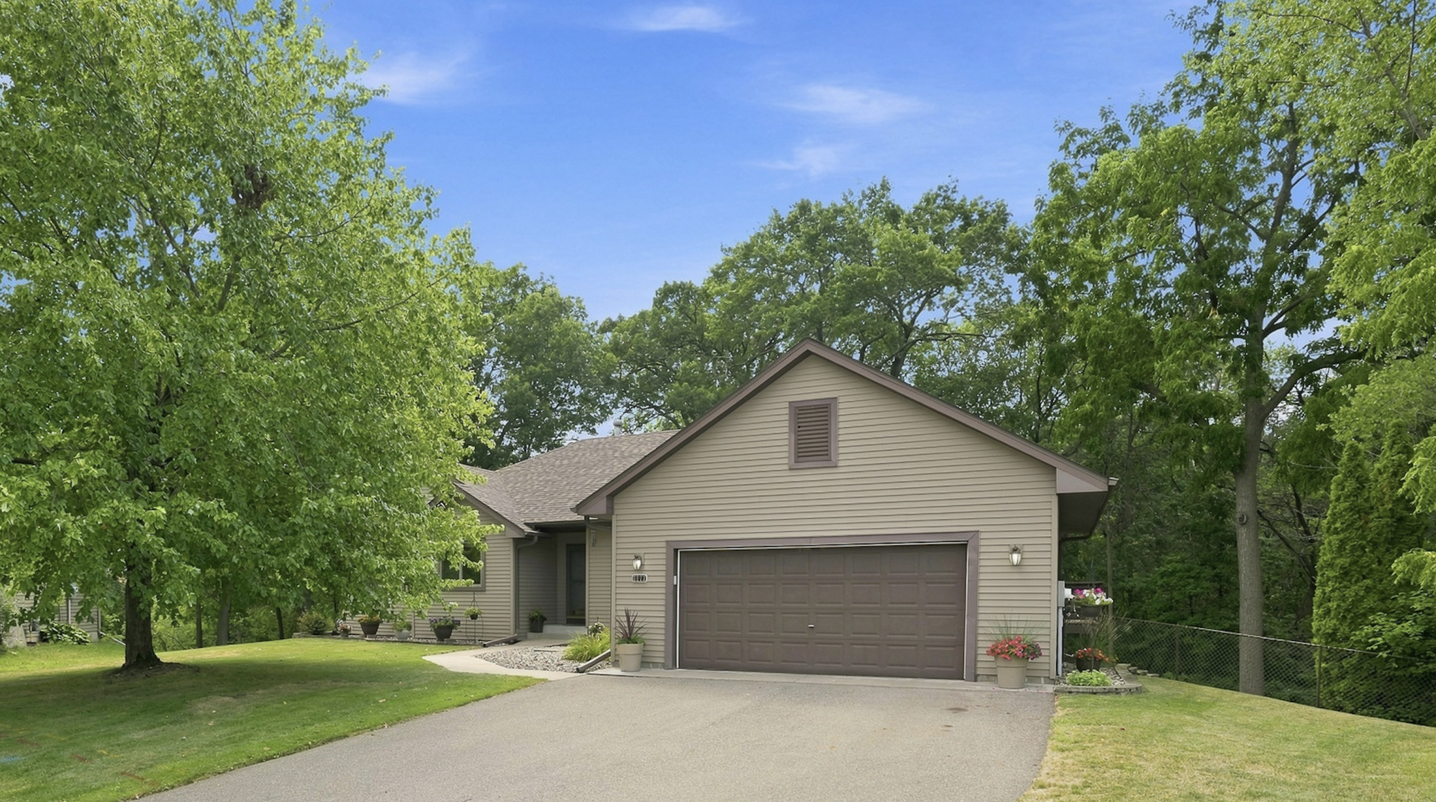 Welcome Home! This Spacious One-Level Home is Located in a Cul-de-sac and Features an Inviting Setting with Mature Trees and Attractive Landscaping. A Wooded Area Borders the Rear Yard, Providing a Beautiful Natural Backdrop and Added Privacy