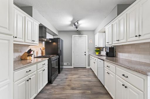 Walk in through the garage into the kitchen