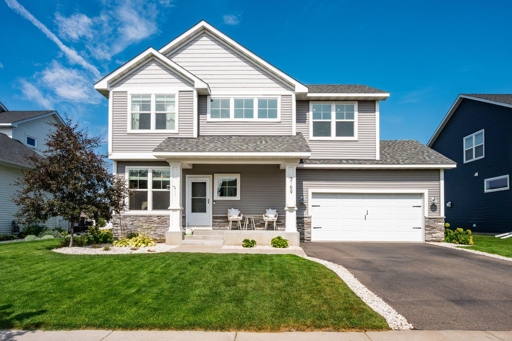 A stunning two-story with a thoughtful floor plan- in the desirable Sterling Ponds neighborhood!