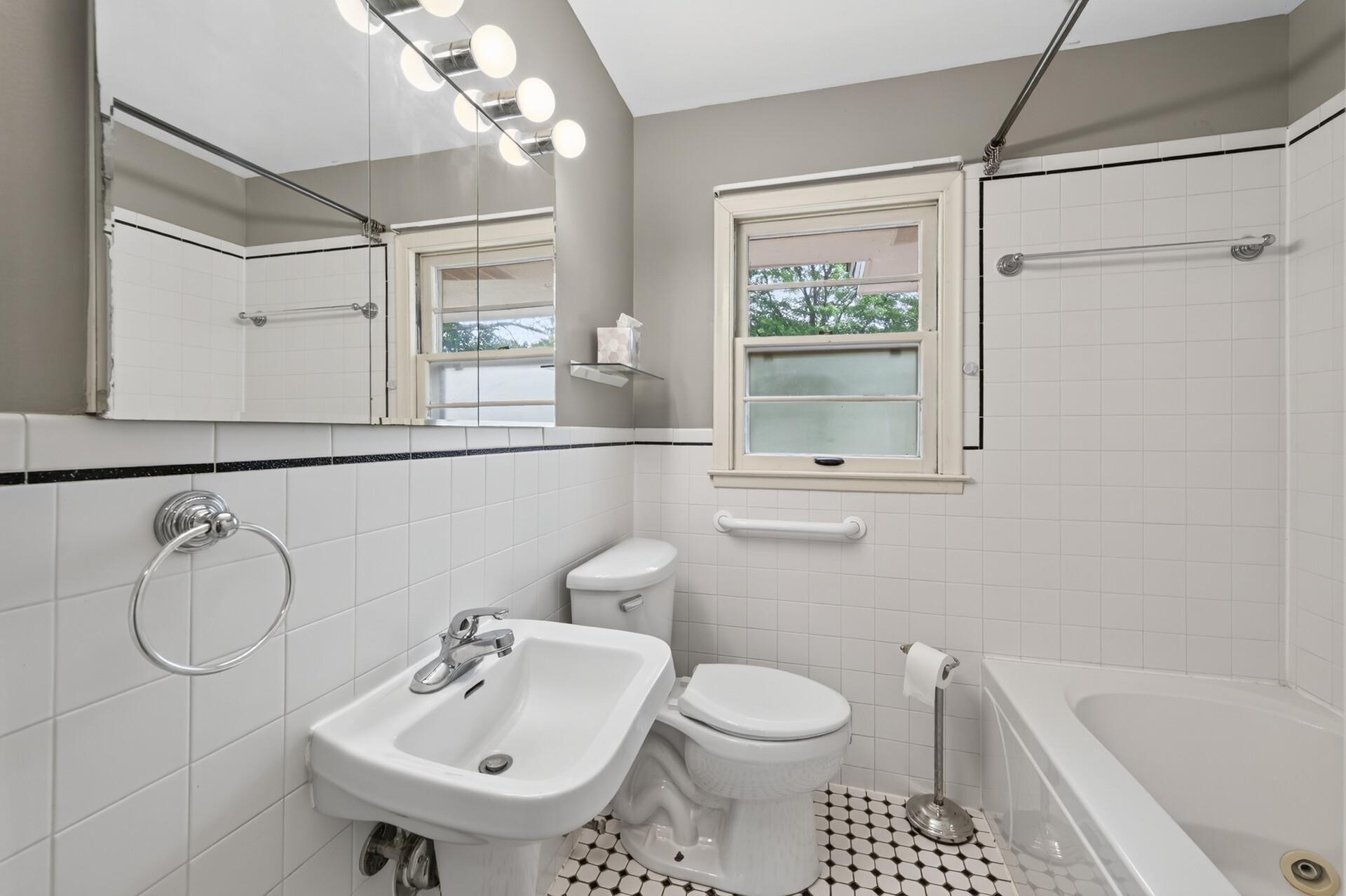 Look - it's NOT Pink! Mid century tile and accents in Full Bath.