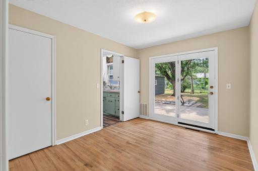 #3 Bedroom/Den also boasts a beautiful French Door to backyard.