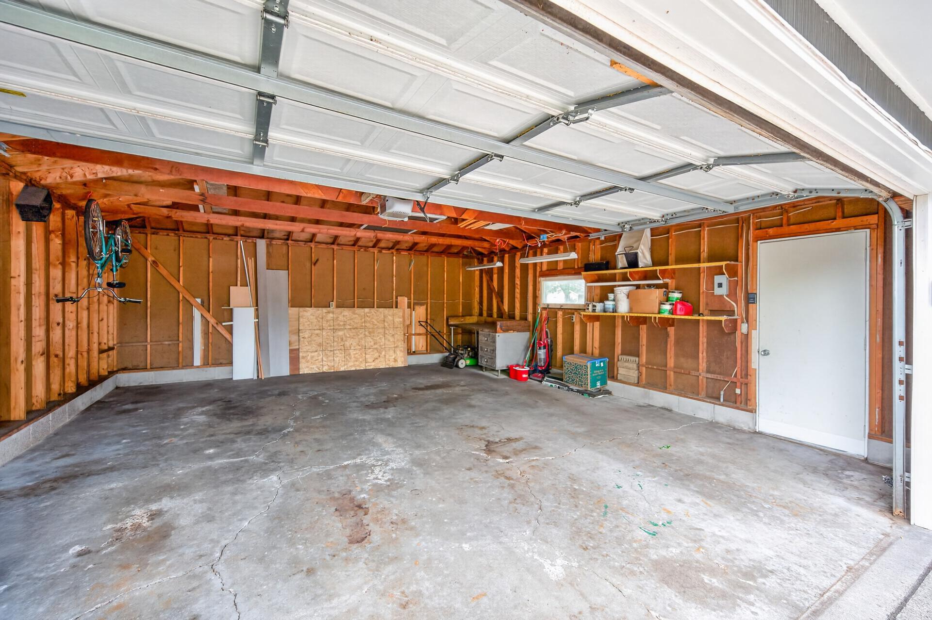 Cars. Toys. Mower - there's room for it all!
