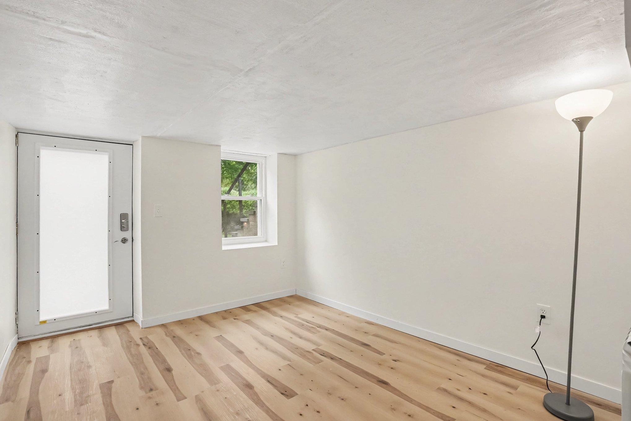Lower Level Living Room or Office with separate walk out entrance.