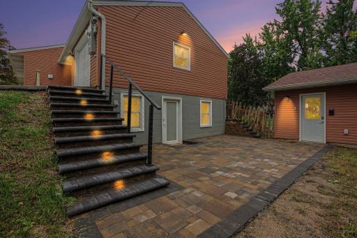New stone steps and patio to lower level entrance and 2nd garage.