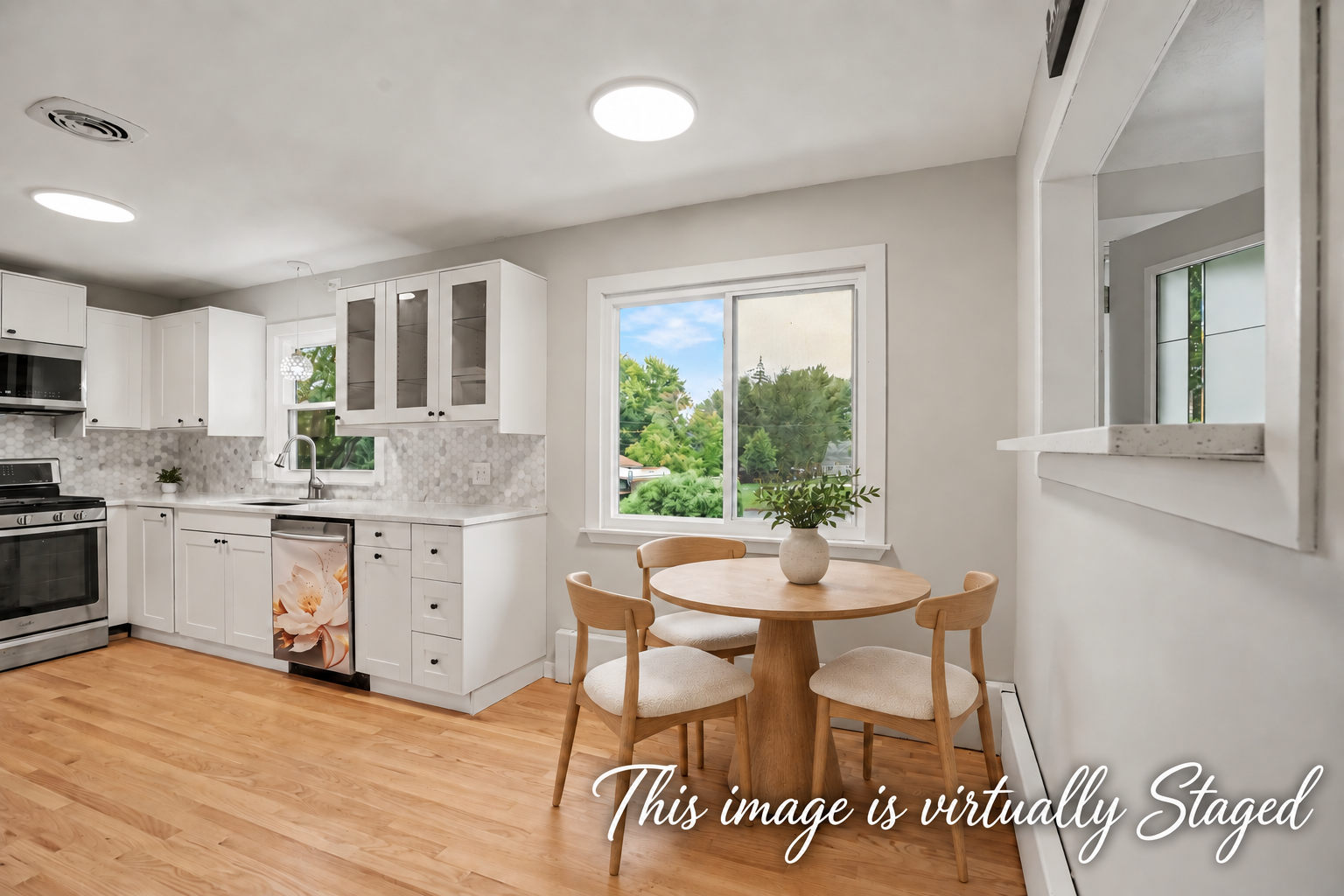 VIRTUALLY STAGED DINING AREA WITH TABLE & CHAIRS