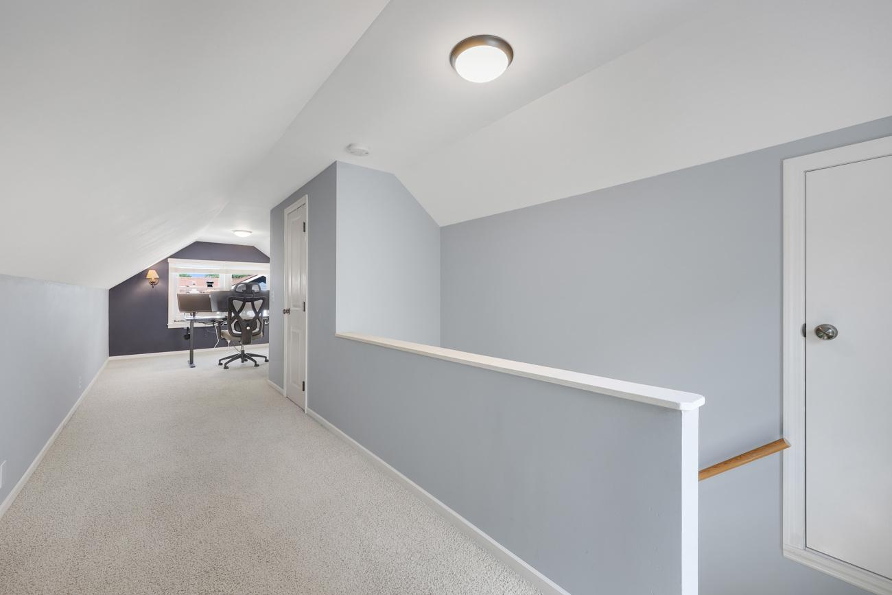 Roomy upper level is perfect for a primary bedroom or additional living space with large walk in closet