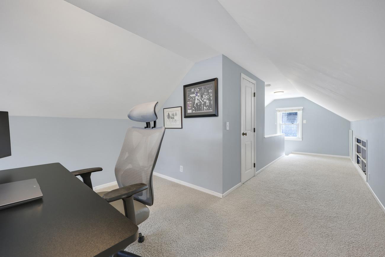 Spacious room offering flexibility for a bedroom, office, playroom, and more.