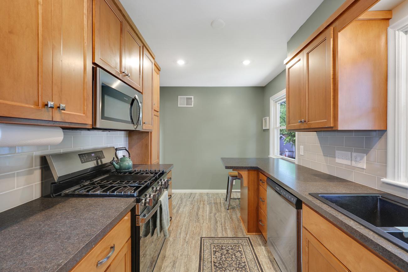 Offering generous cabinetry and counter space.