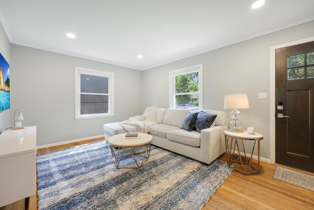 Welcoming home filled with natural light from multiple windows.