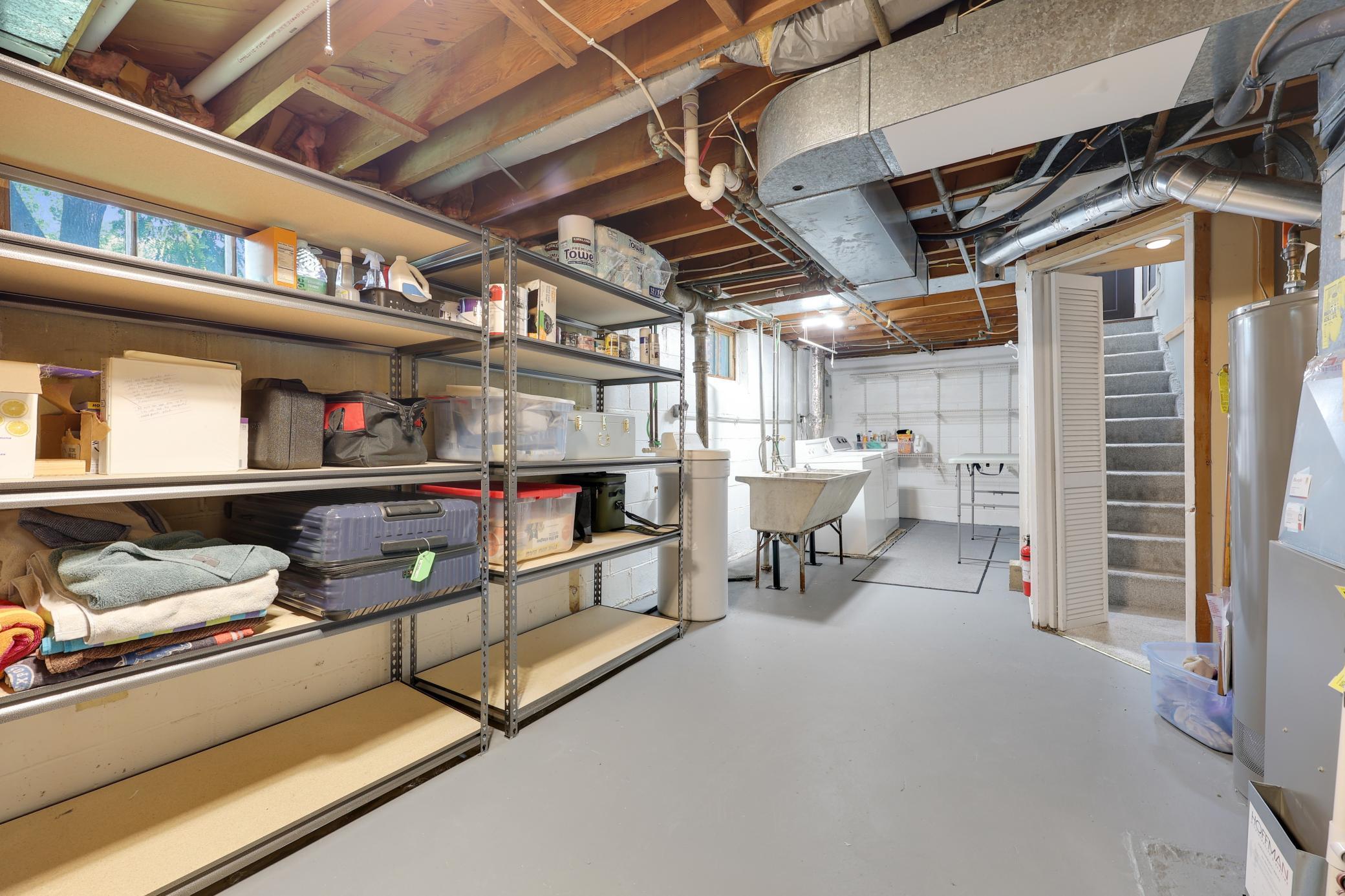 Neat and well maintained and utility room downstairs with laundry.