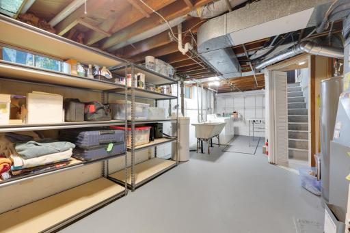 Neat and well maintained and utility room downstairs with laundry.