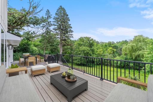 Seamless access to the expansive maintenance-free deck overlooking beautiful Purgatory Creek greenspace.