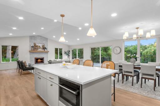 Enjoy a large center island with breakfast bar seating, along with a dedicated pantry space.