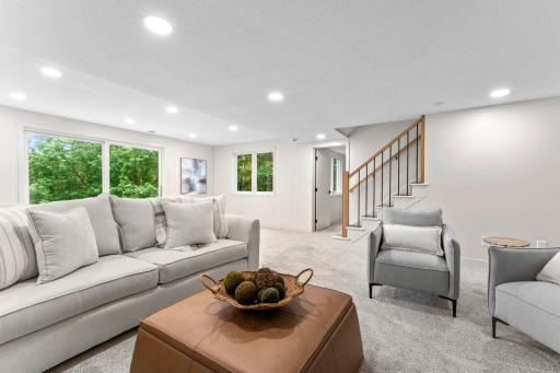 The walkout lower level continues to impress with an abundance of flexible living and entertaining space.