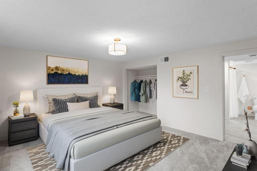 An additional lower-level bedroom offers excellent flexibility as a private guest retreat, home office, fitness room, or hobby space.